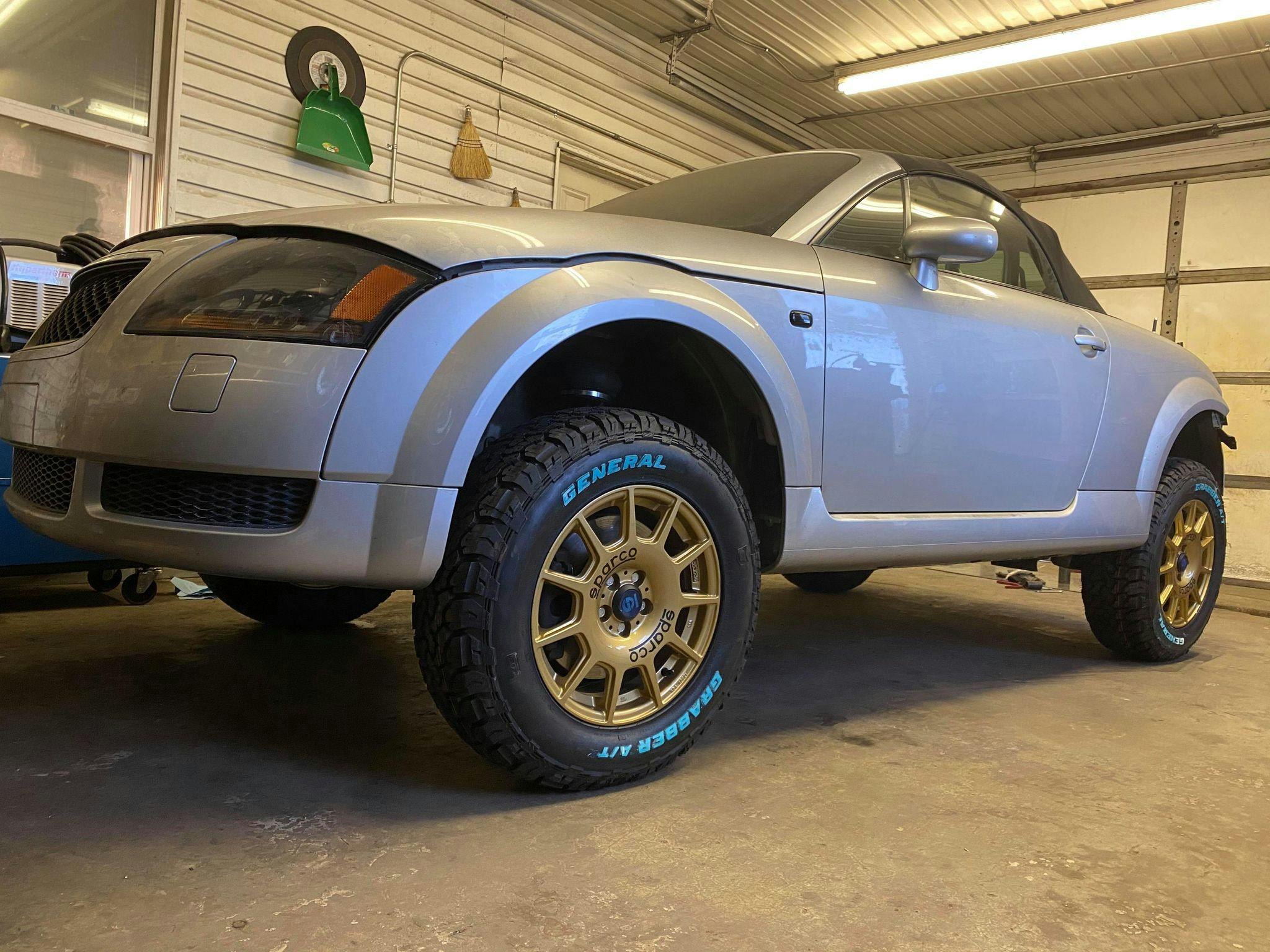 With air suspension and oversized tires, Troy Unruh has radically reimagined this Audi TT into an off-road outfit that can handle mud and snow. The heater is strong enough for cruising with the top down during the winter.