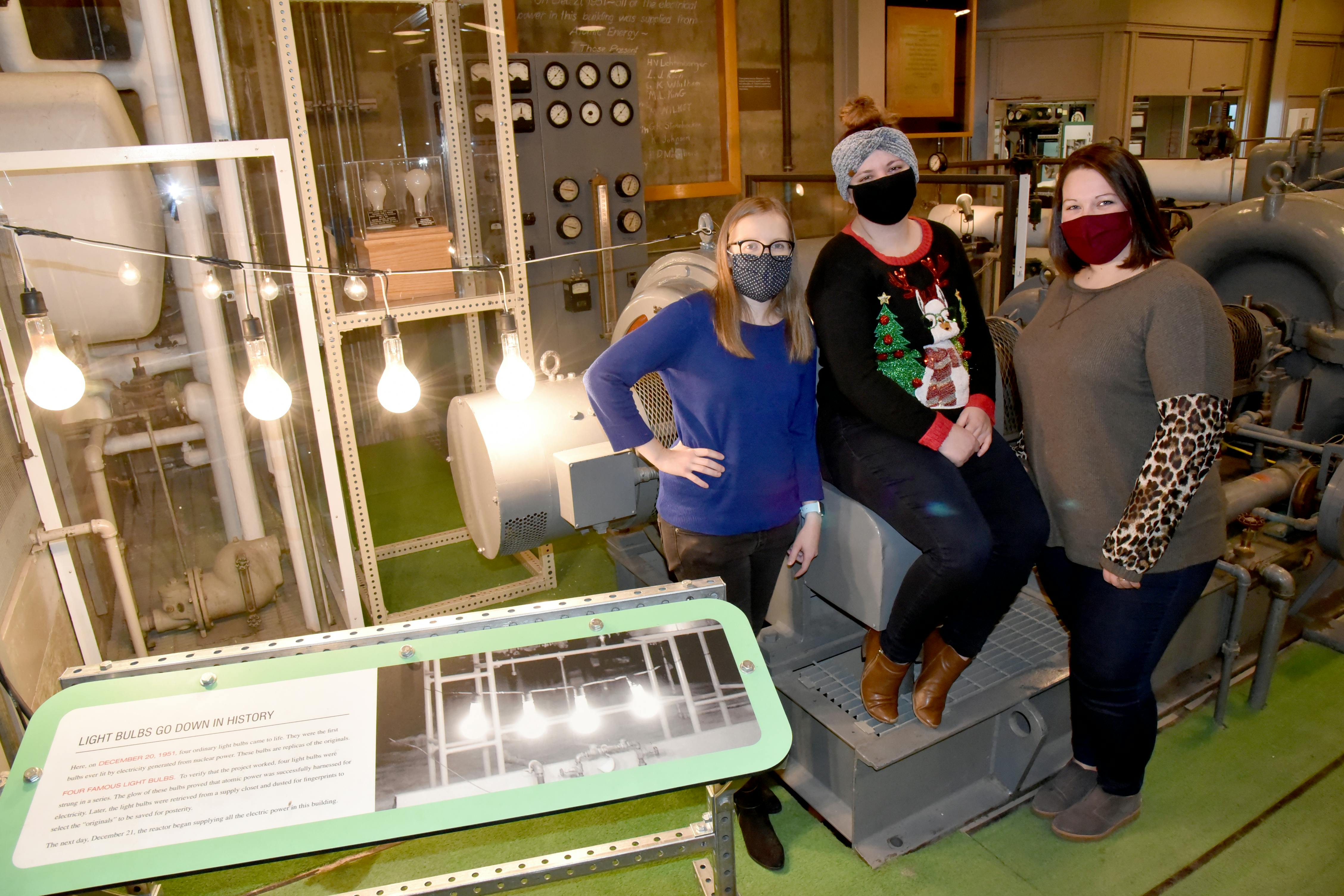 EBR 1, EBR-I, EBR 1 museum, Idaho museum, nuclear history, nuclear energy history, three women standing in an industrial setting next to four lightbulbs