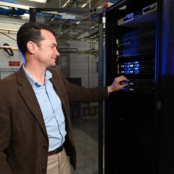 Sam Edwards checking the status of cellular servers at INLs wireless test range